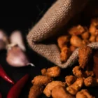 Deluxe Coated Chilli and Garlic Cashews 3 Spicy Coated Chilli and Garlic Cashews perfect for snacking